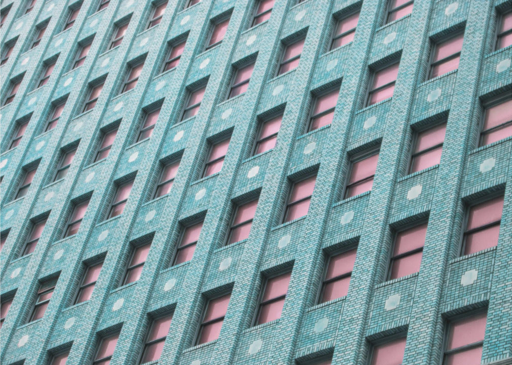 Brick Building with Pink Windows | Canvas